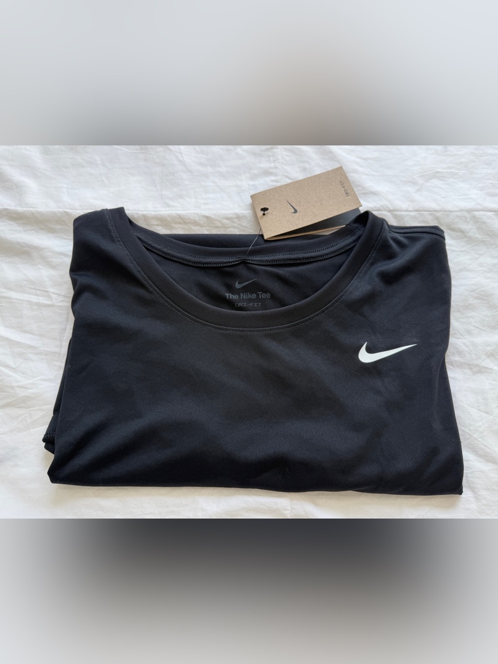 Nike Black Short Sleeve Women's Athletic Tee with White Swoosh